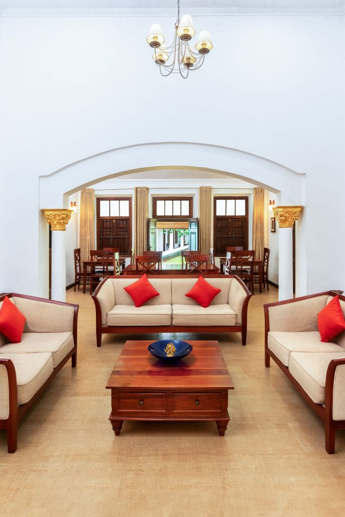 The elegant welcome hall of Flamingo Villa in Jaffna, featuring stylish decor, comfortable seating, and a warm, inviting atmosphere.