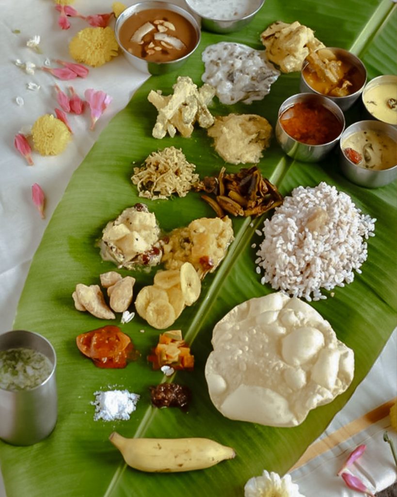Close-up view of Jaffna special meals served on banana leaves, featuring traditional dishes such as spicy curries, rice, and side items, arranged in a visually appealing and authentic presentation.